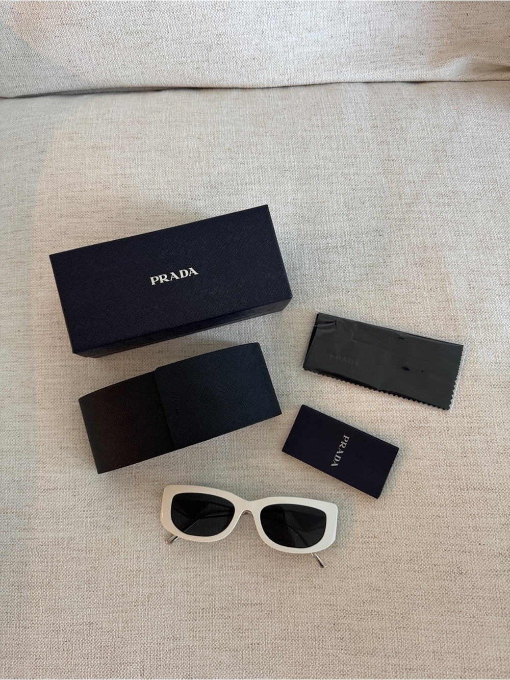 Prada White Frame Sunglasses with Black Lenses